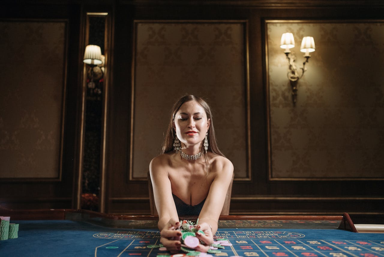 Sophisticated woman in casino setting holding chips, exuding luxury and anticipation.